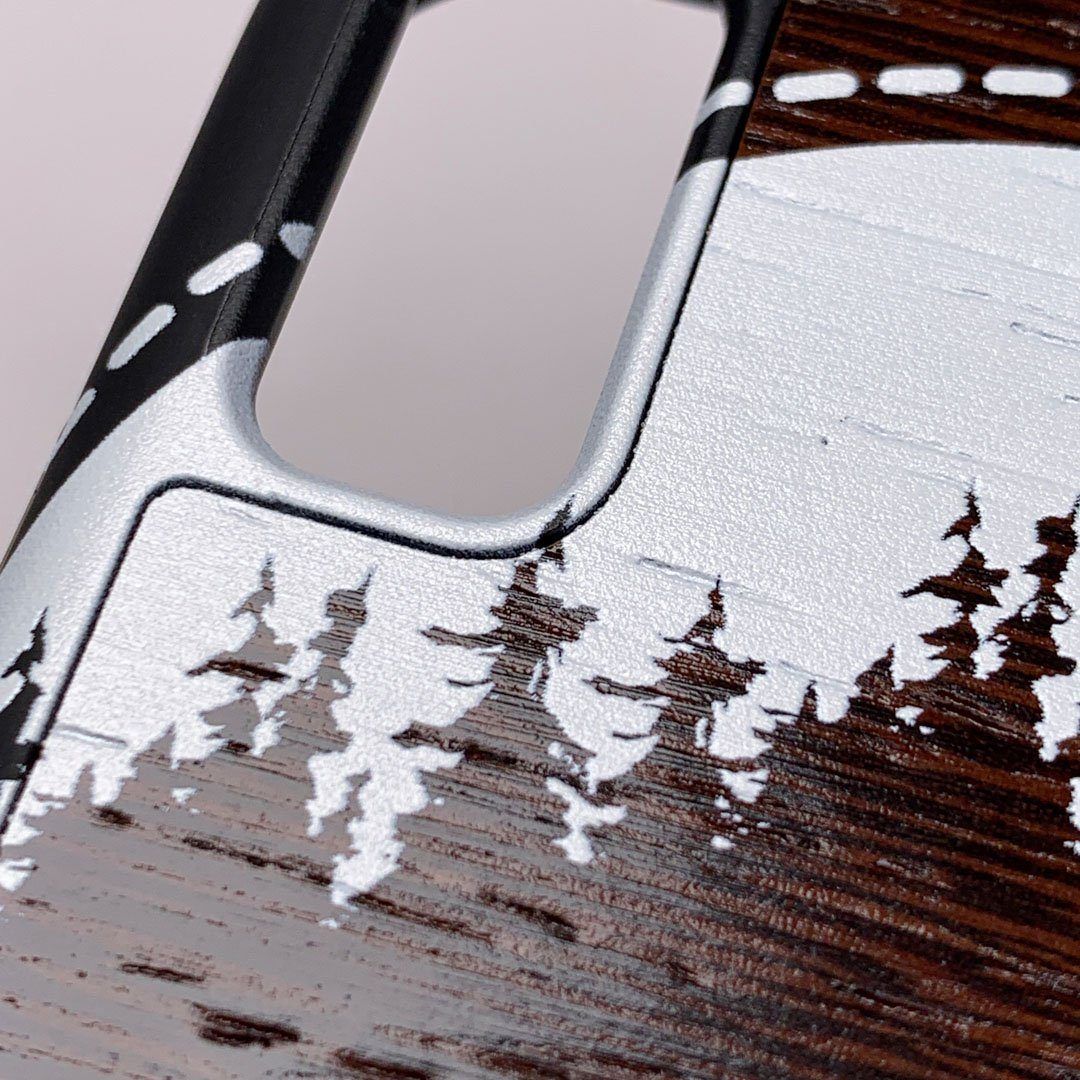 Zoomed in detailed shot of the high-contrast spotted bass printed Wenge Wood iPhone 12 Mini Case by Keyway Designs