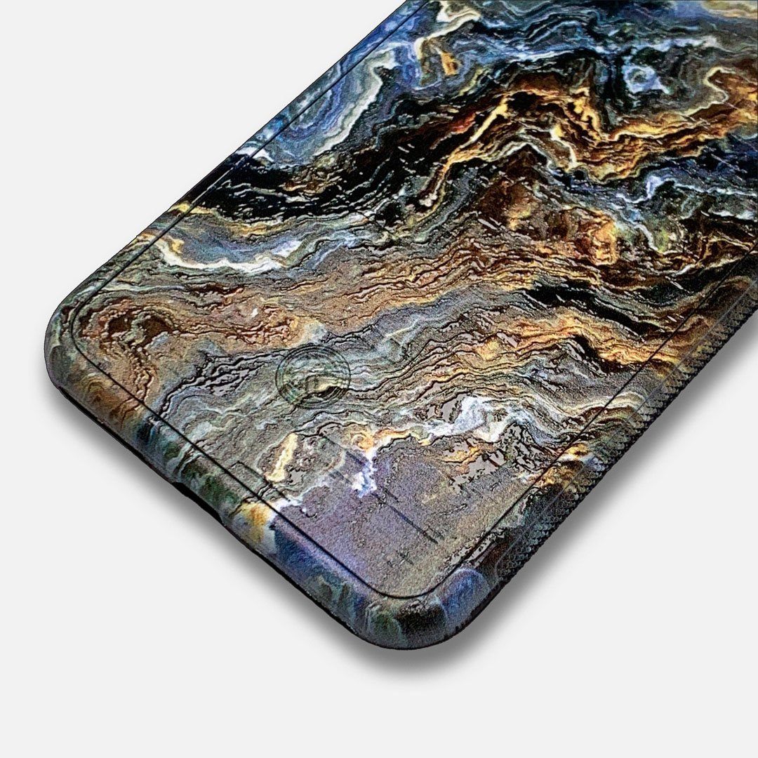 Zoomed in detailed shot of the vibrant and rich Blue & Gold flowing marble pattern printed Wenge Wood Galaxy S10+ Case by Keyway Designs