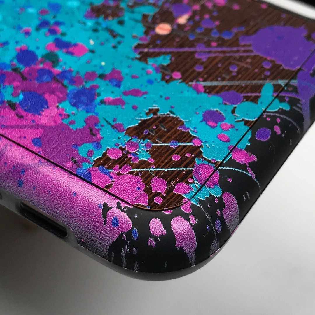 Zoomed in detailed shot of the realistic paint splatter 'Chroma' printed Wenge Wood Galaxy S8+ Case by Keyway Designs