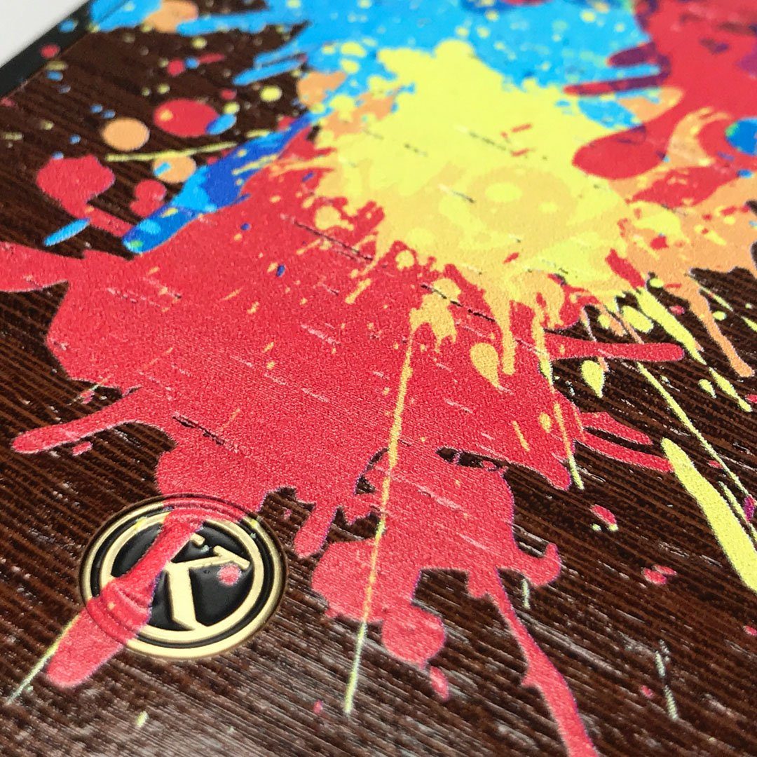 Zoomed in detailed shot of the illustration-style paint drops printed Wenge Wood iPhone 5 Case by Keyway Designs