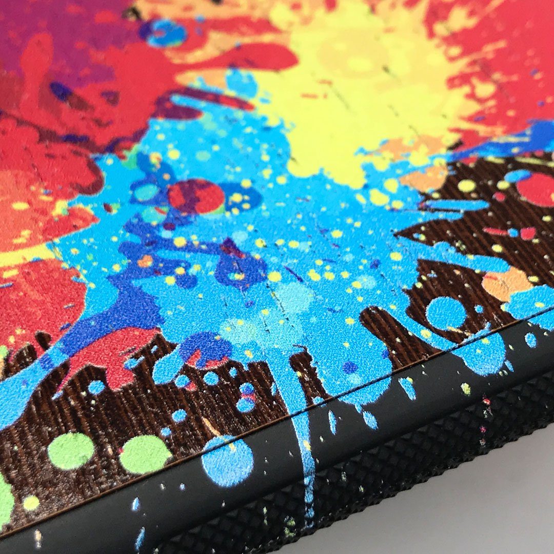 Zoomed in detailed shot of the illustration-style paint drops printed Wenge Wood iPhone X Case by Keyway Designs