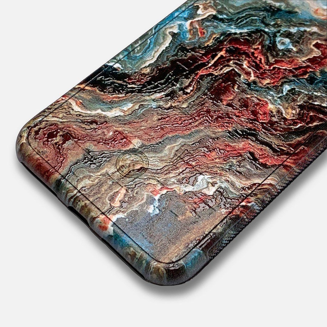Zoomed in detailed shot of the vibrant and rich Red & Green flowing marble pattern printed Wenge Wood iPhone 11 Pro Case by Keyway Designs