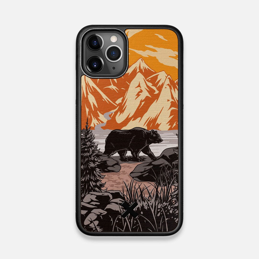 Front view of the stylized Kodiak bear in the mountains print on Wenge wood iPhone 11 Pro Case by Keyway Designs