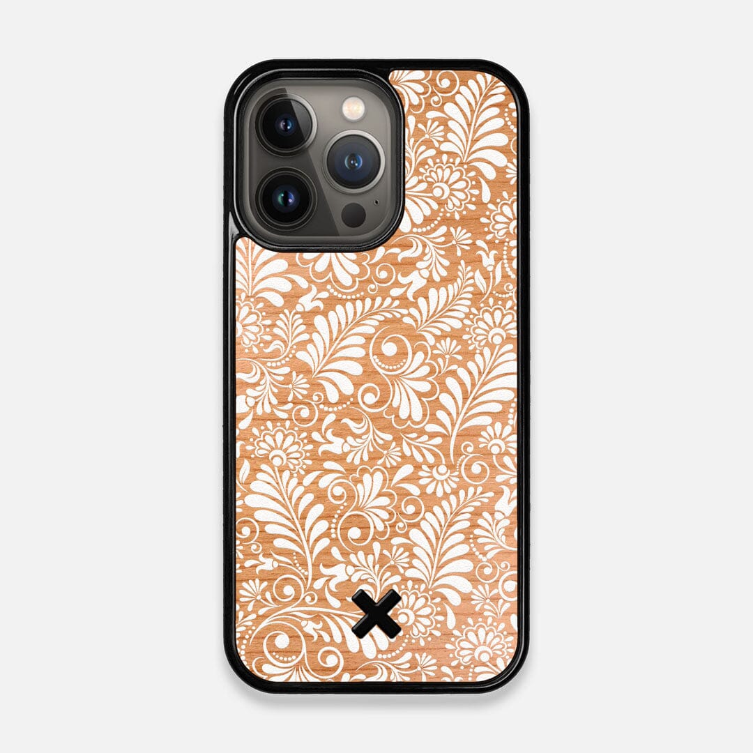 Front view of the white ink flowing botanical print on Cherry wood iPhone 13 Pro Case by Keyway Designs