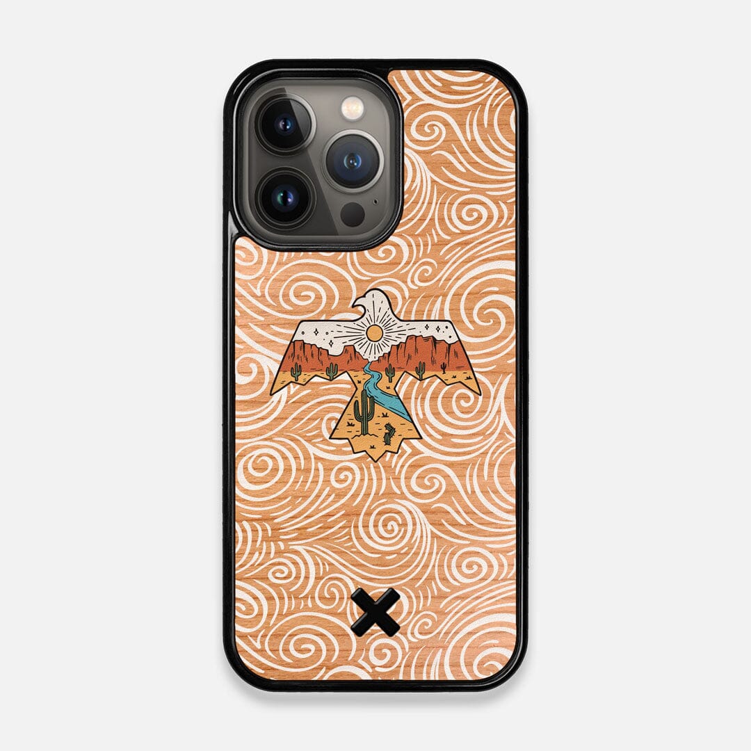 Front view of the double-exposure style eagle over flowing gusts of wind printed on Cherry wood iPhone 13 Pro Case by Keyway Designs