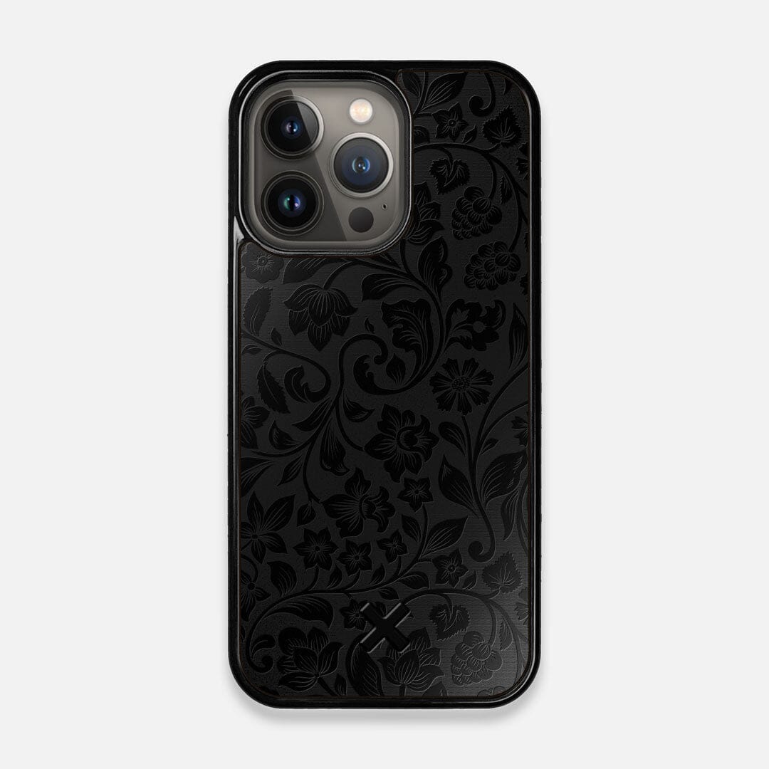 Front view of the highly detailed midnight floral engraving on matte black impact acrylic iPhone 13 Pro Case by Keyway Designs