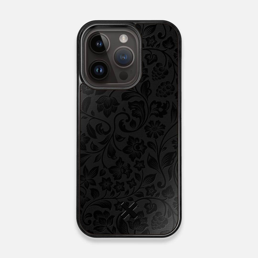 Front view of the highly detailed midnight floral engraving on matte black impact acrylic iPhone 14 Pro MagSafe Case by Keyway Designs